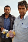 These 2 men passed me on the Iranian gulf coast and decided to buy me a few things